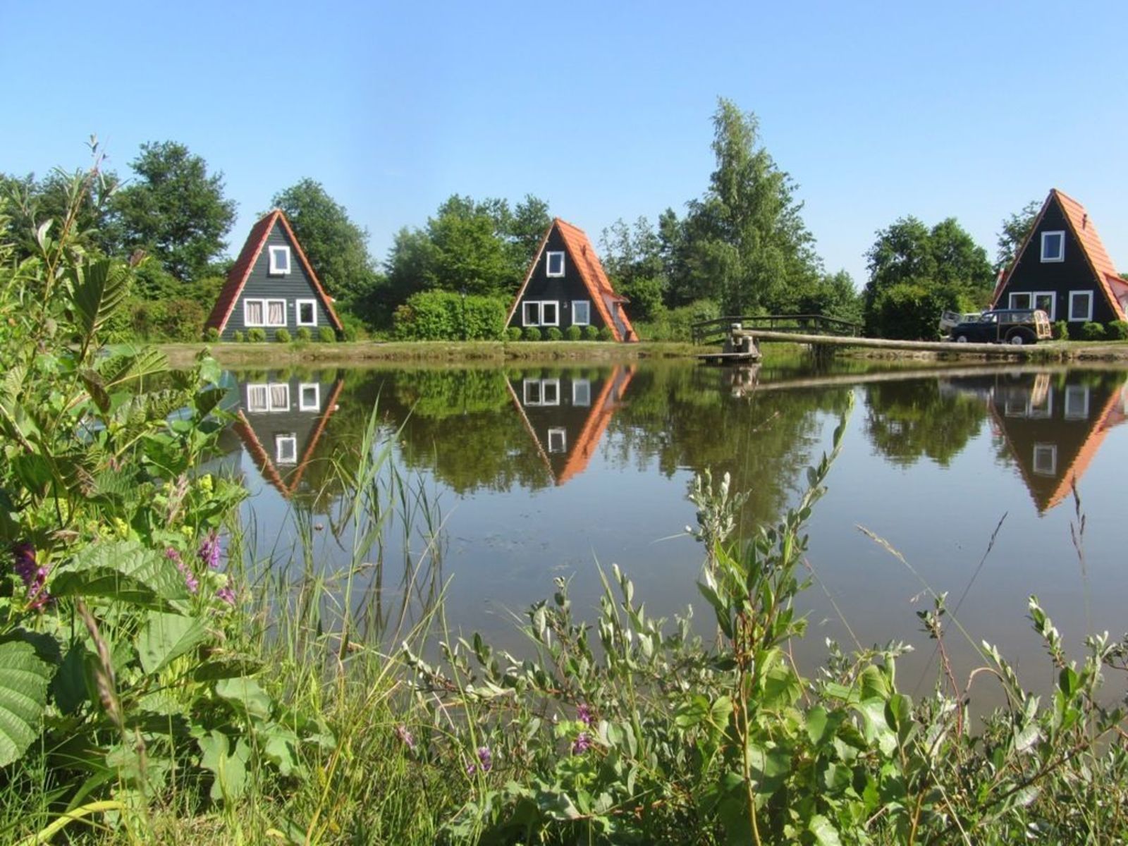 Group accommodation: Large Log Cabin + 3 Fishermen’s houses (18 people)