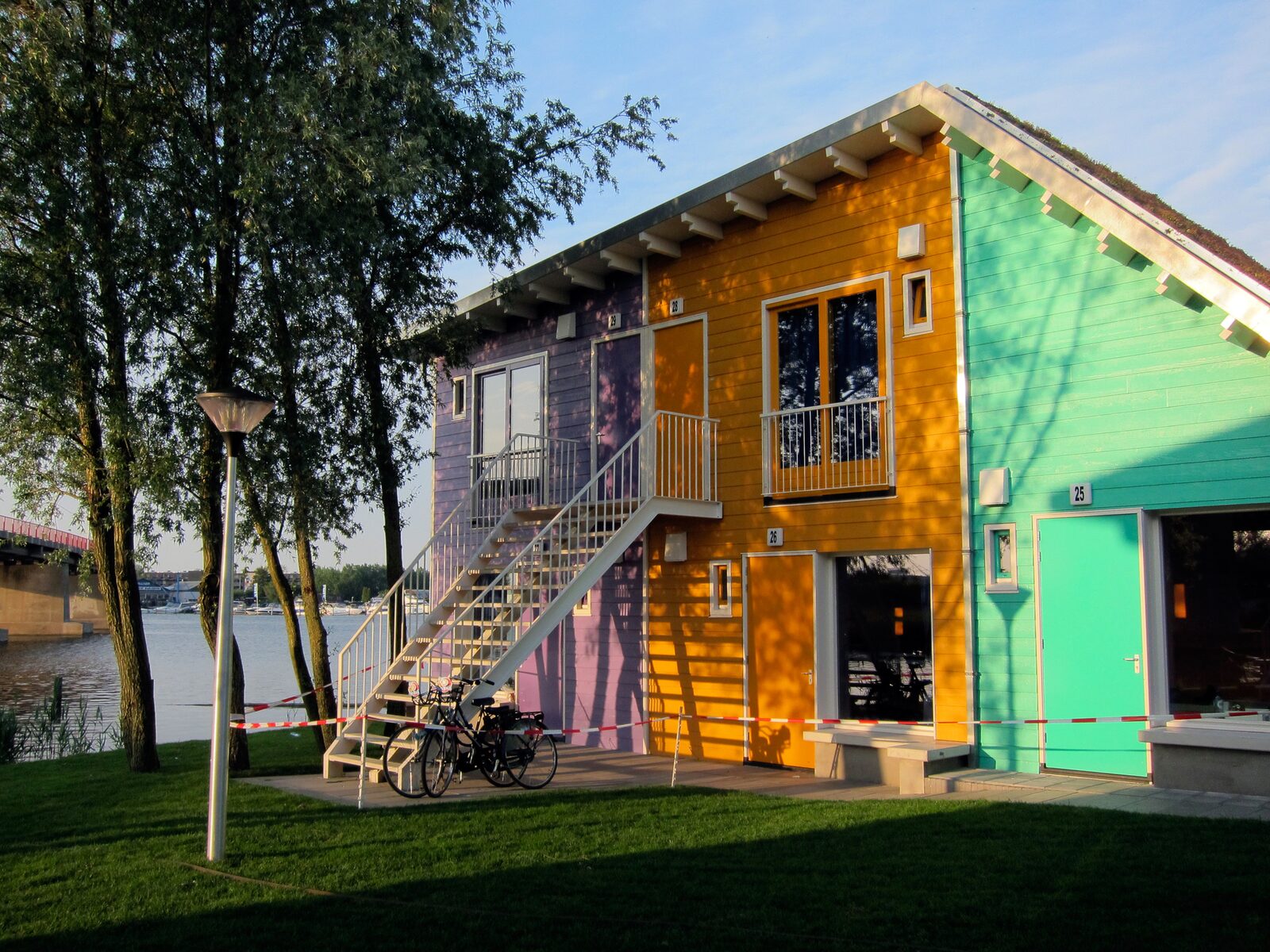 A two-person and a four-person Eco Cabin above each other on the waterfront