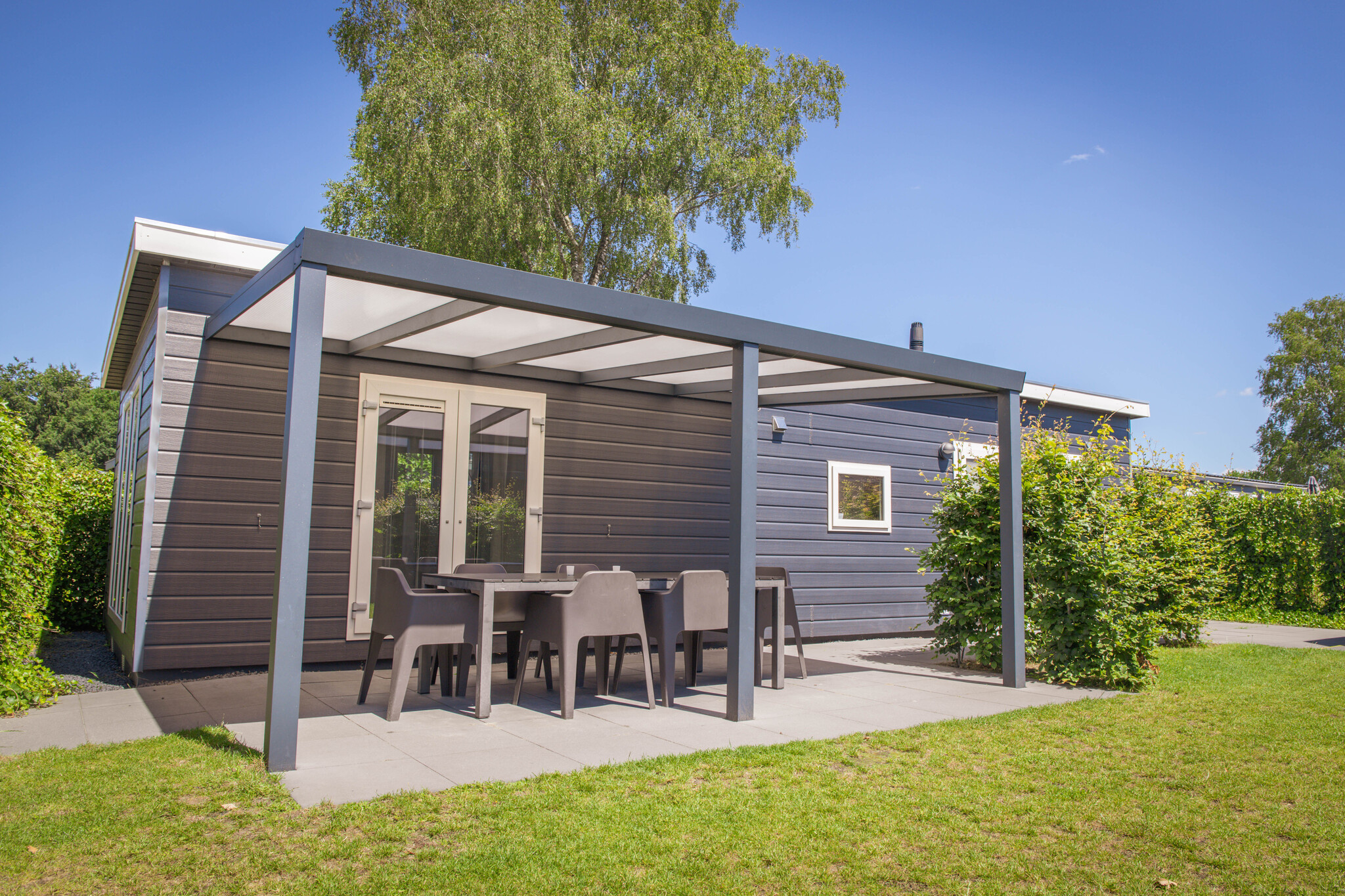 Gruppenunterkunft für 12 Personen mit finnischer Grill Kota und überdachter Terrasse – perfekt für einen gemeinsamen Urlaub auf der Veluwe!