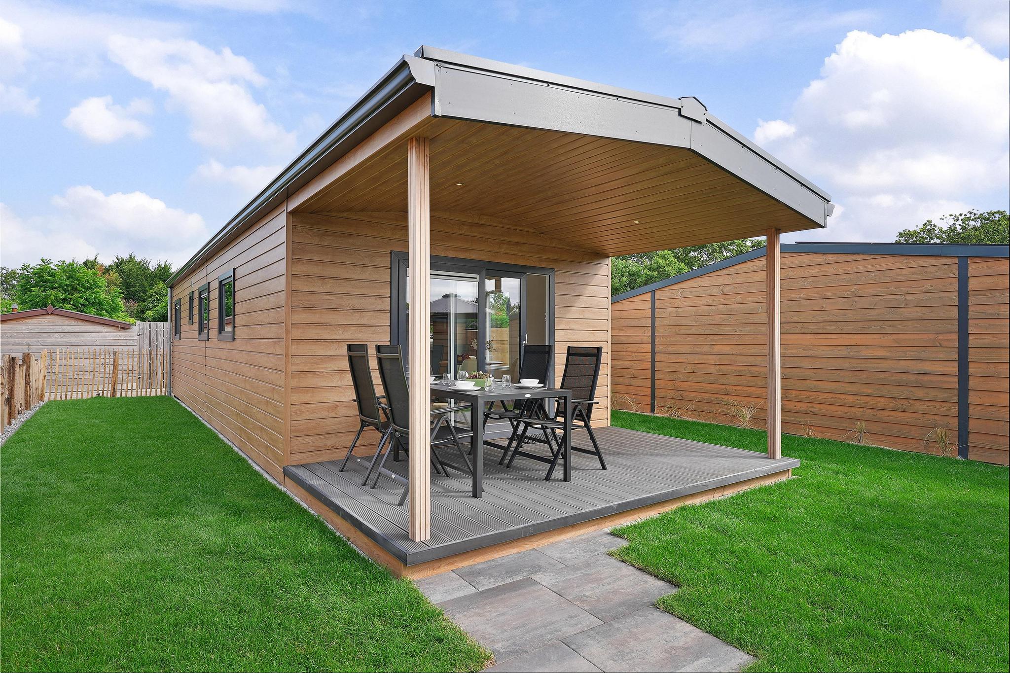 Gemütliches Chalet mit Veranda und großem Garten, in der Nähe von Strand und Düne.