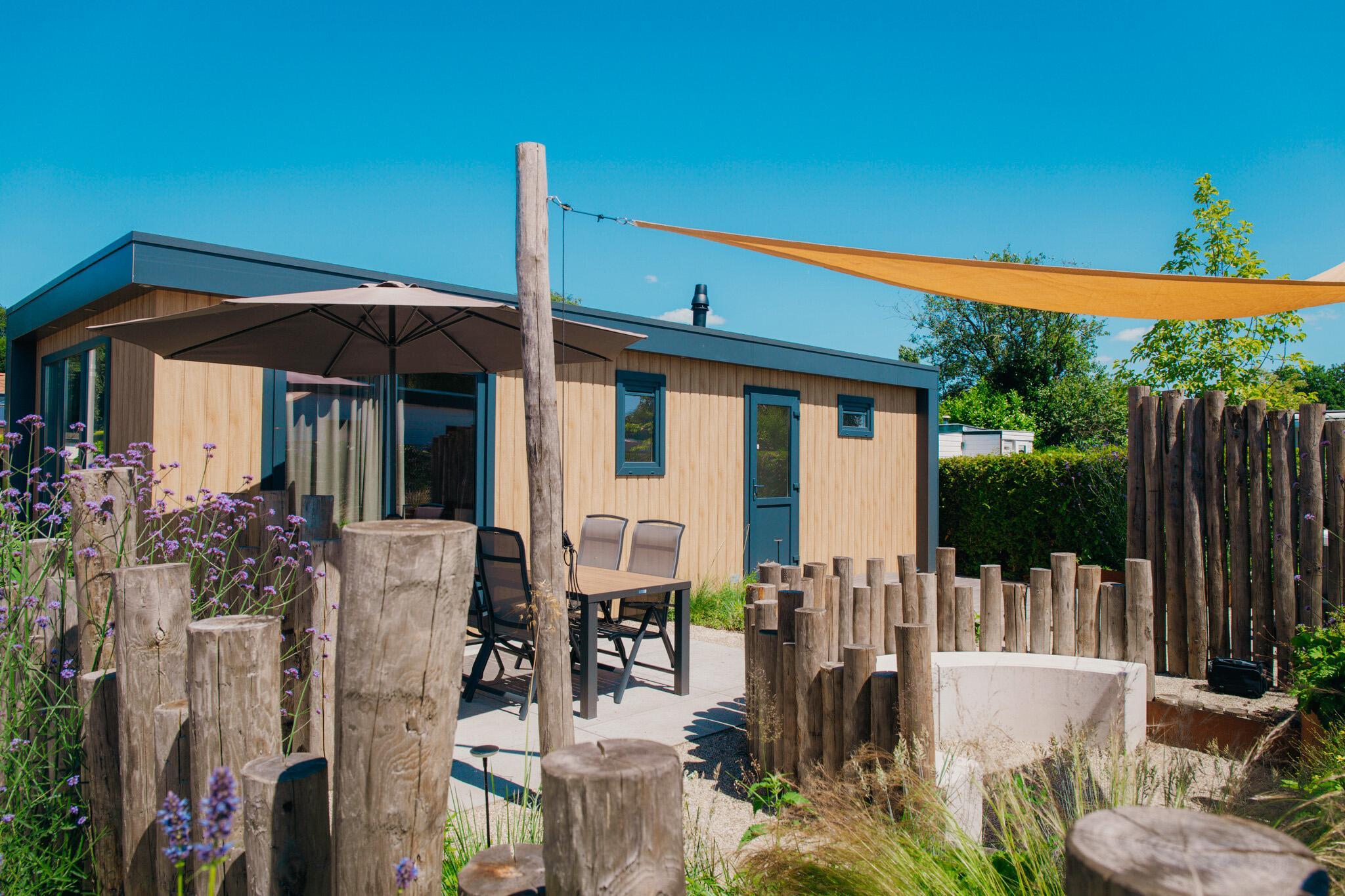 Luxuriöse Voortse Villa für 4 Personen mit Whirlpool im Garten, in der Nähe von Restaurant und Schwimmbad auf der Veluwe. Perfekt für entspannende Ferien.