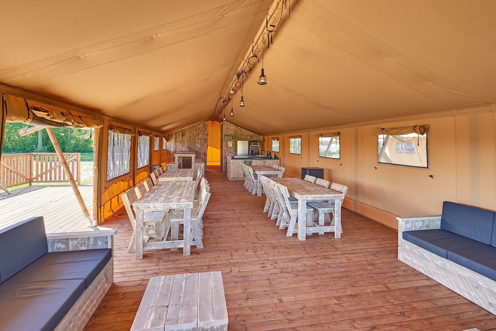 Group accommodation: group tent + four 6-person luxury glamping tents (24 people)