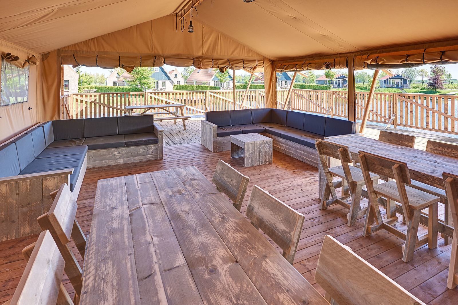 Group accommodation: group tent + four 6-person luxury glamping tents (24 people)