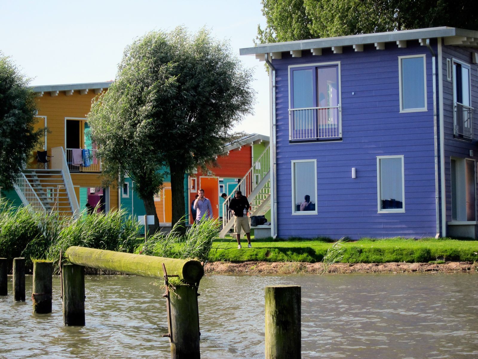 2 x four-person eco cabins next to each other on the waterfront 